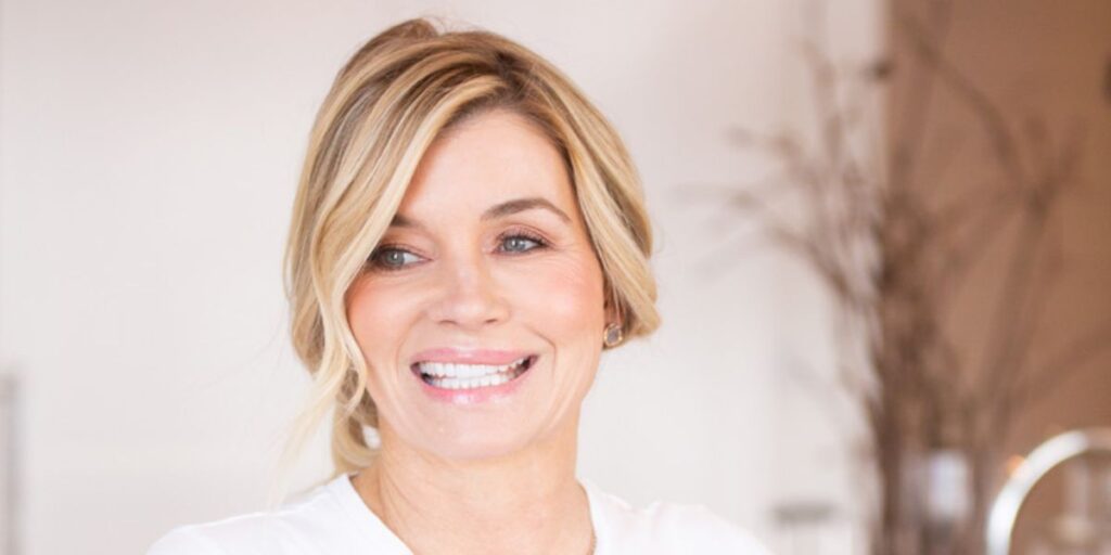 “Nadine Macaluso smiling in 2025 — therapist, former model, author and survivor advocate portrait”