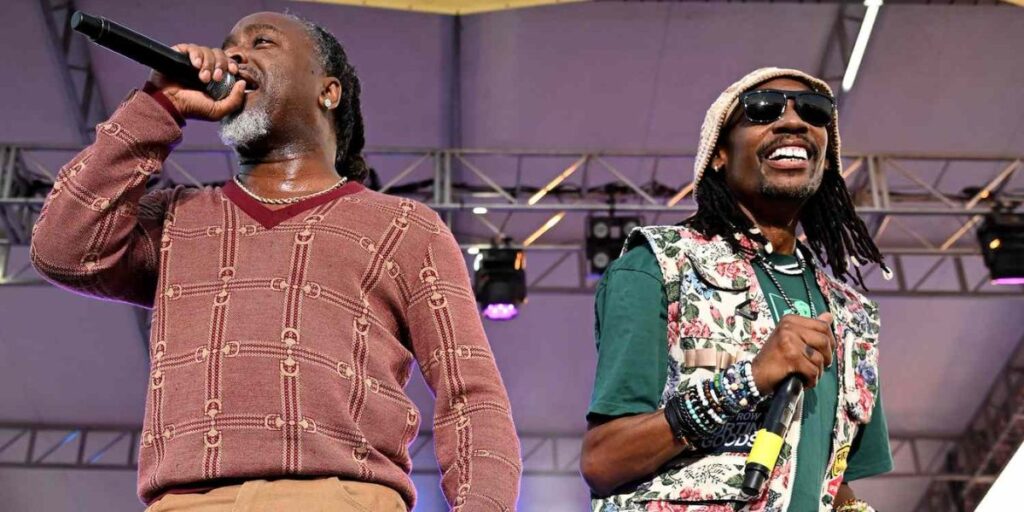Ying Yang Twins performing live on stage in a high-energy hip-hop concert.