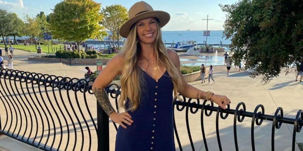 Kayla Morton smiling in 2025 during a candid moment, showcasing her confident personality as a professional drag racer.