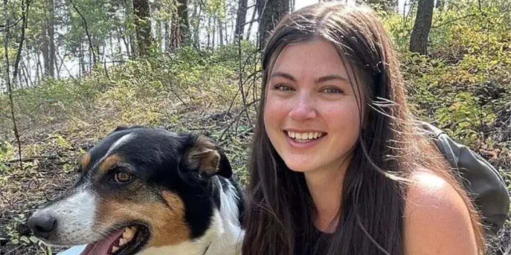 Madison Clysdale with her dog enjoying outdoor adventure
