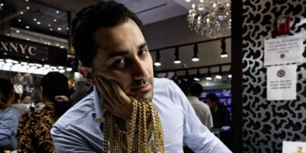 Maksud Agadjani wearing gold jewelry from TraxNYC luxury collection net worth 2025