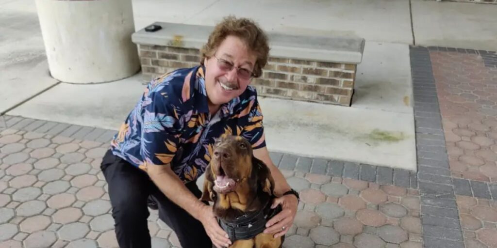 Jack Hartmann with his dog in a relaxed personal moment
