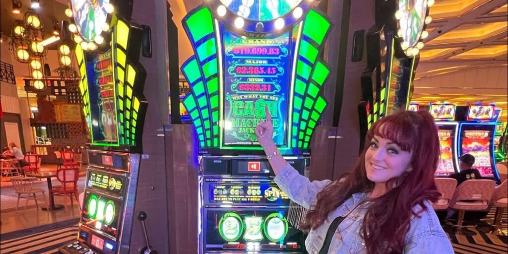 Slot Hopper standing next to a cash jackpot machine during a YouTube slot gameplay session