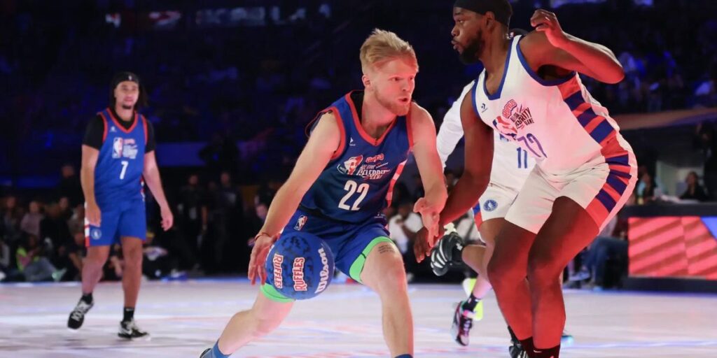 Tristan Jass playing basketball on court, showcasing his skills as a professional athlete and digital influencer in 2025