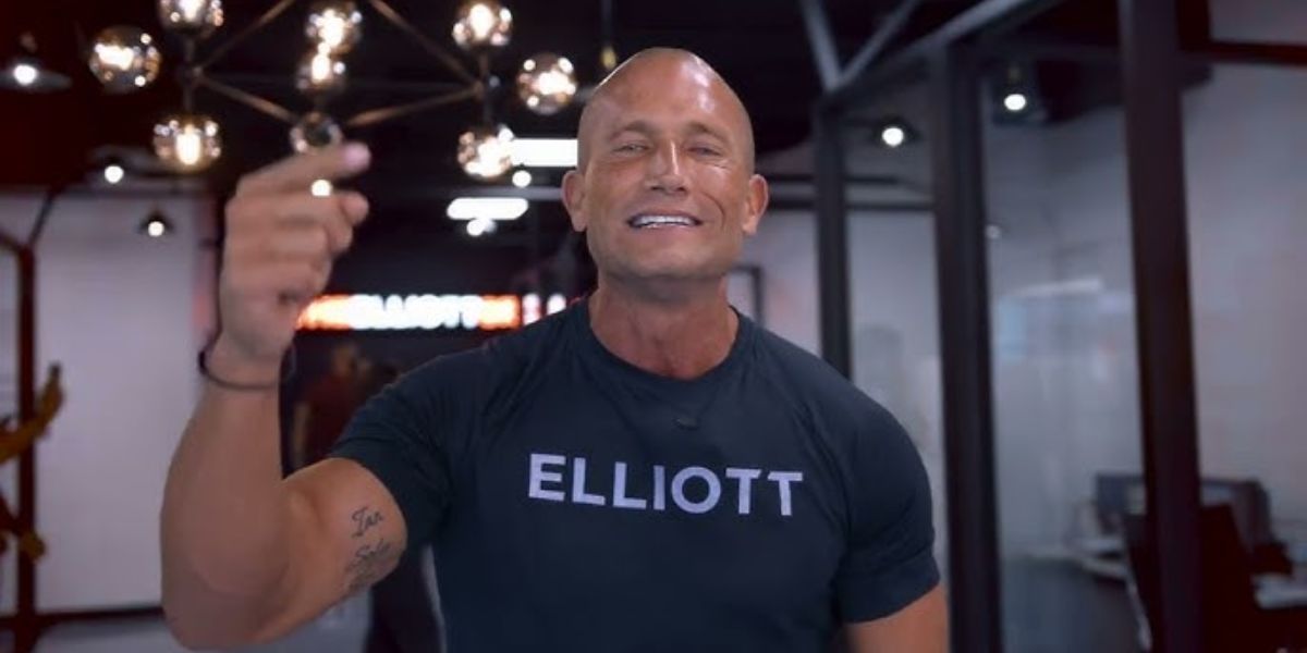 Andy Elliott smiling confidently while sharing sales and business insights, 2025