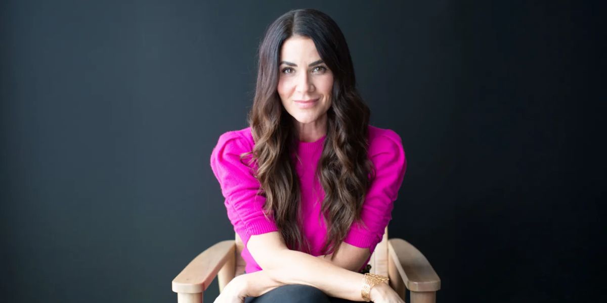 Tara Leigh Cobble posing simply, showcasing her approachable and inspiring personality